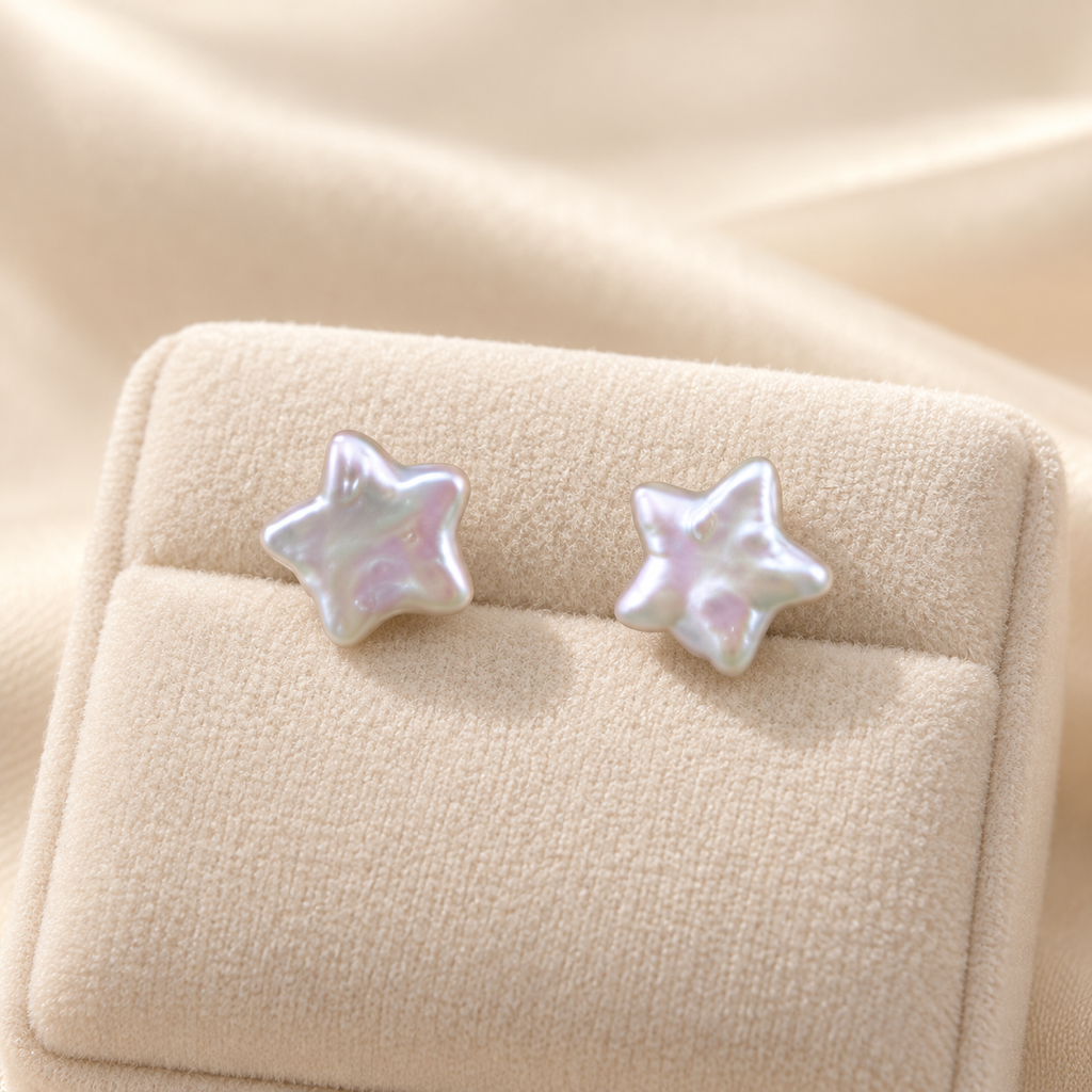 VEEKISSY celestial star pearl stud earrings, pair on ivory display cushion