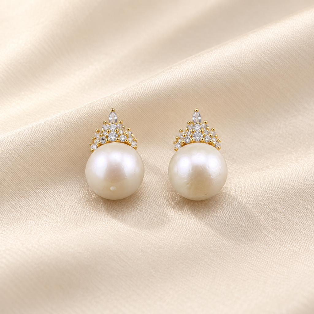 VEEKISSY royal elegance pearl stud earrings, pair on ivory fabric