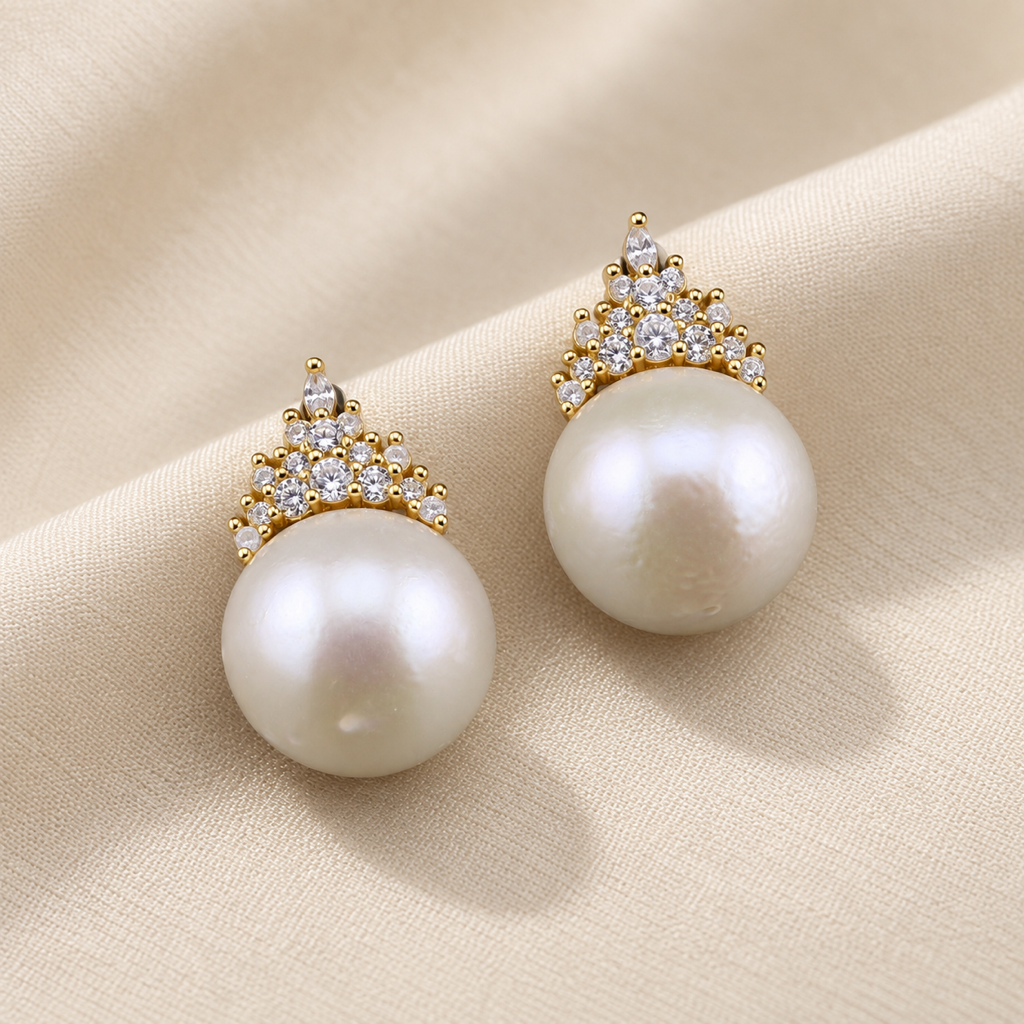 VEEKISSY royal elegance pearl stud earrings, alternative pair angle on cream fabric