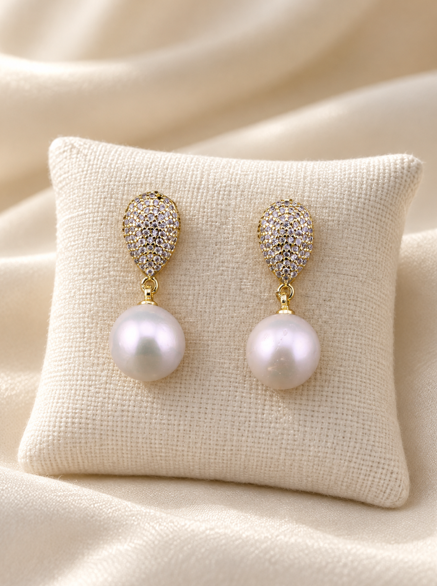 VEEKISSY edison pearl drop earrings, pair on ivory display cushion